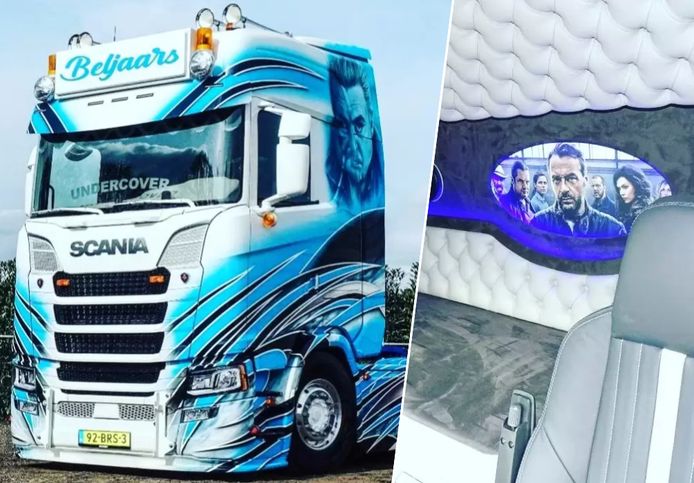 Deze Scania maakt sinds begin deze maand indruk op Nederlandse wegen. Op het portier van de chauffeur prijkt het personage van Ferry Bouwman (Frank Lammers), aan de andere kant staat Bob Lemmens (Tom Waes). Ook het interieur is aangepast.