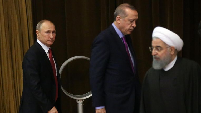 Overleg in Sotsji met de presidenten Poetin (Rusland), Erdogan (Turkije) en Rouhani (Iran). Beeld Getty Images