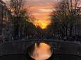 Prachtige zonsondergang in Amsterdam: dit is hoe zo'n lucht ontstaat