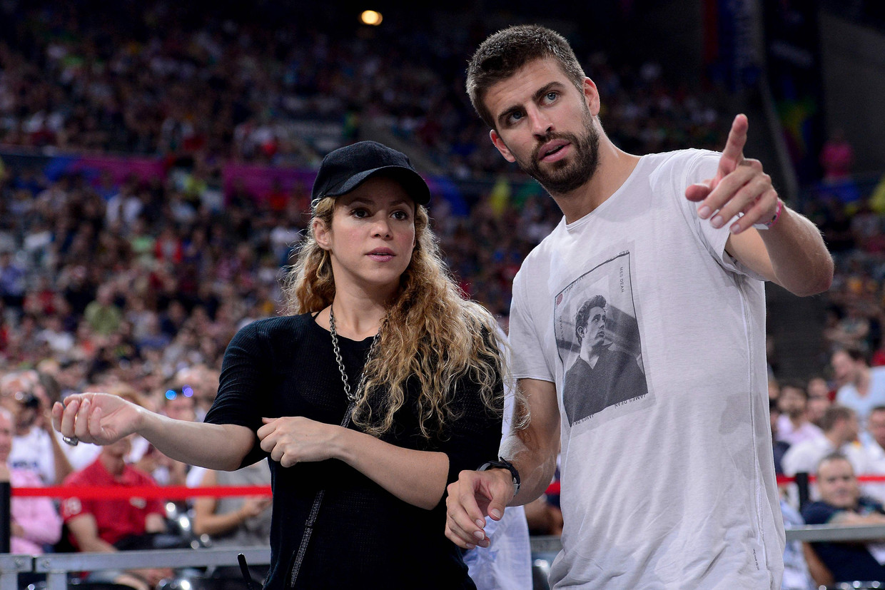 Ex-voetballer Gerard Piqué en zangeres Shakira in 2014.  Beeld AFP