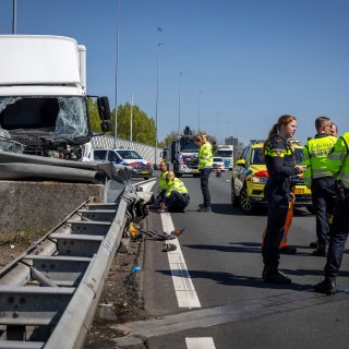 Two injured in crash between truck and car on A10, two lanes closed