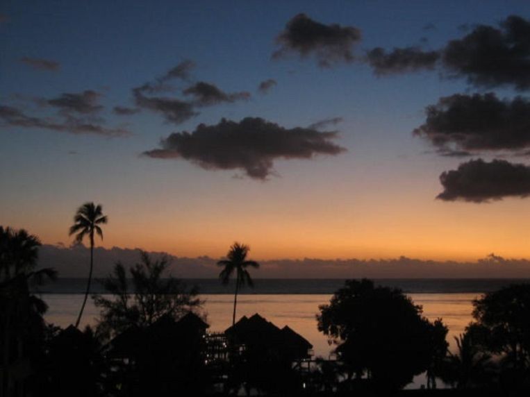 Zonsondergang in Tahiti. Beeld Flickr