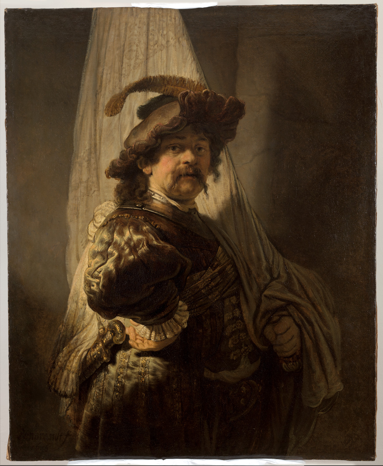 Rembrandt van Rijn, ‘De vaandeldrager’ (1636). Olieverf op doek, 118,8 x 96,8 cm, collectie Rothschild. Beeld Rijksmuseum