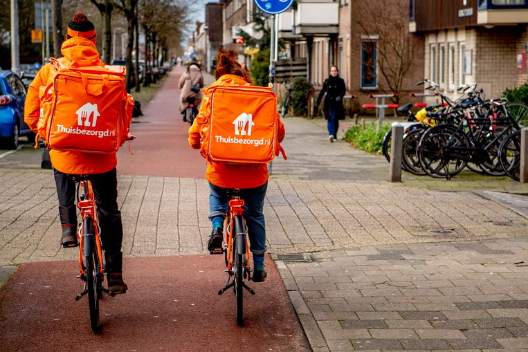 Maaltijdbezorgers van Thuisbezorgd. Beeld Robin Utrecht, ANP