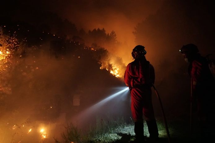 Firefighters work in the Sierra de Gata in the Spanish region of Extremadura.