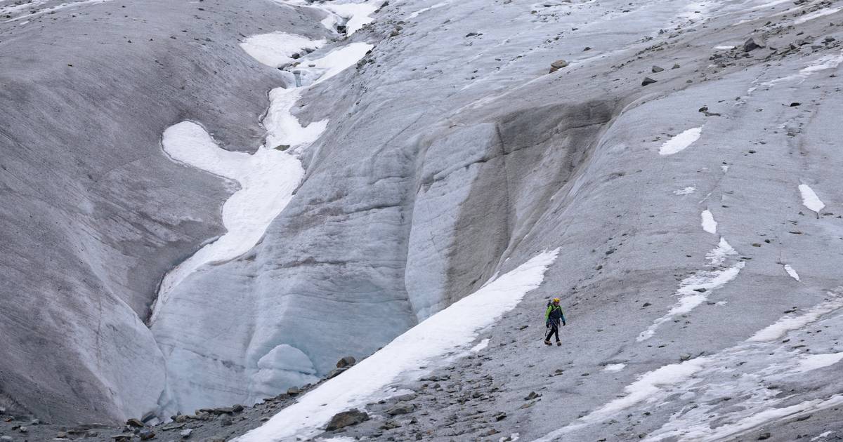 A mountain peak cuts through the Austrian Alps |  outside
