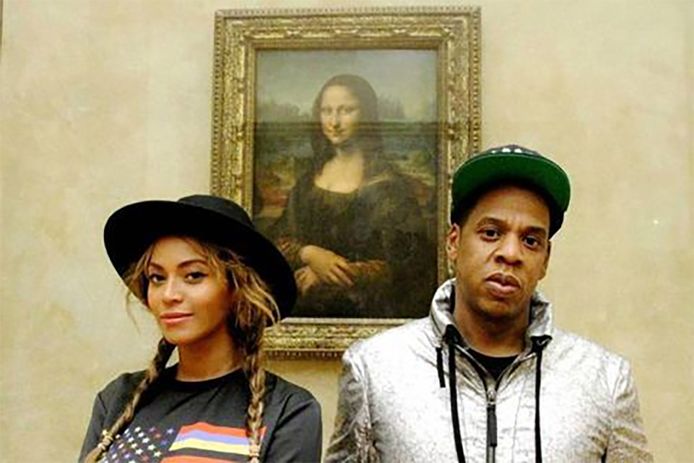 Beyoncé en Jay Z bij de Mona Lisa. De kans is klein dat een gewone sterveling een gelijkaardig kiekje kan nemen.