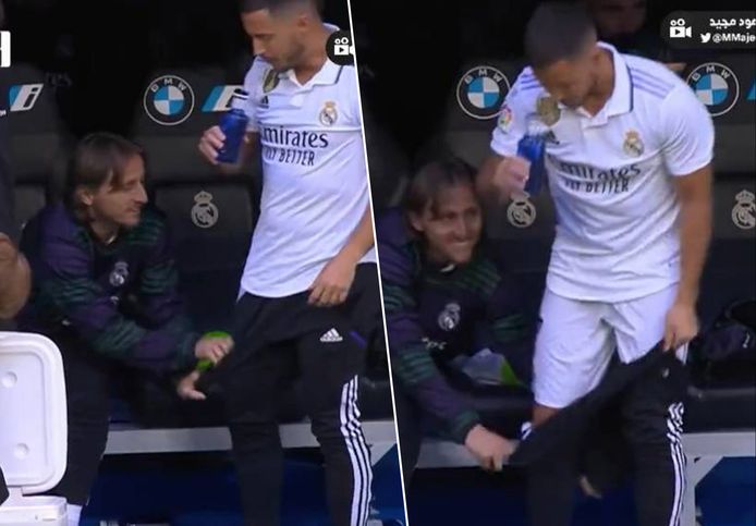 Modric helps Hazard.
