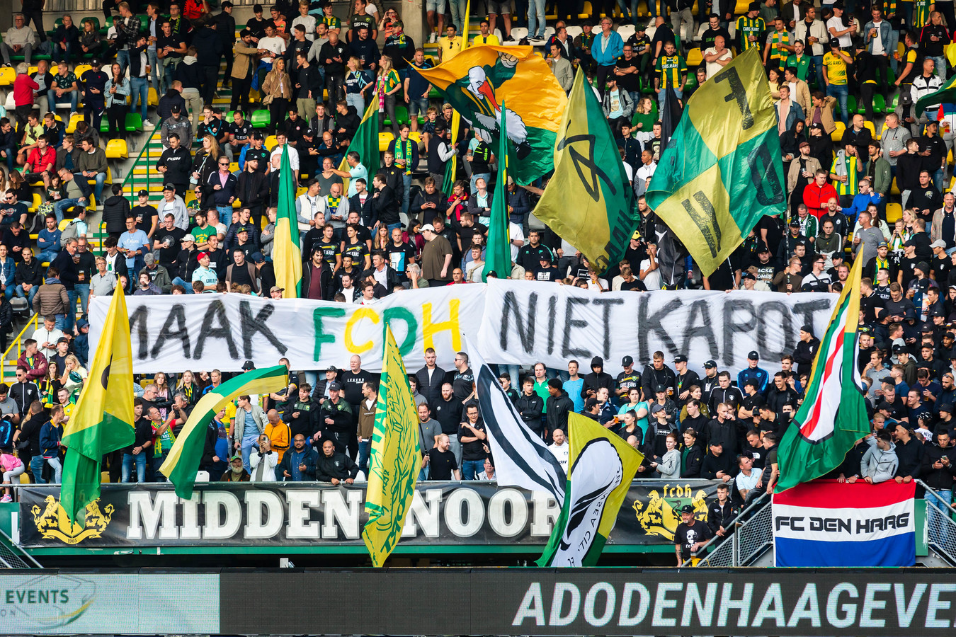 DEN HAAG , 20-08-21 , Season 2021 / 2022 , Keuken Kampioen Divisie , Cars Jeans Stadion , ADO fan with a banner Do not destroy the club before the match ADO Den Haag - FC Emmen