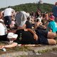 Ondanks hitte en opstoppingen bleef de rozehoedjesbrigade goedgehumeurd. En geen band viel tegen