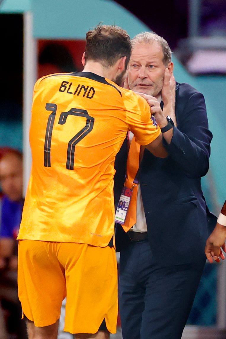 Daley Blind celebrates 2-0 against USA with his father Danny.  Statue by Stanley Konta/Pro Shots