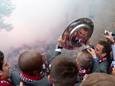 In de schaal is het gezicht van Wout Brama te zien: FC Twente op het bordes na het landskampioenschap in 2010.