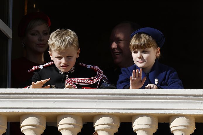 epa10984549 Prince Albert II of Monaco (R), his wife Princess Charlene (L), their twins Prince Jacques (front L) and Princess Gabriella (front R) attend the celebrations marking National Day at the Monaco Palace, in Monaco, 19 November 2023.  EPA/SEBASTIEN NOGIER