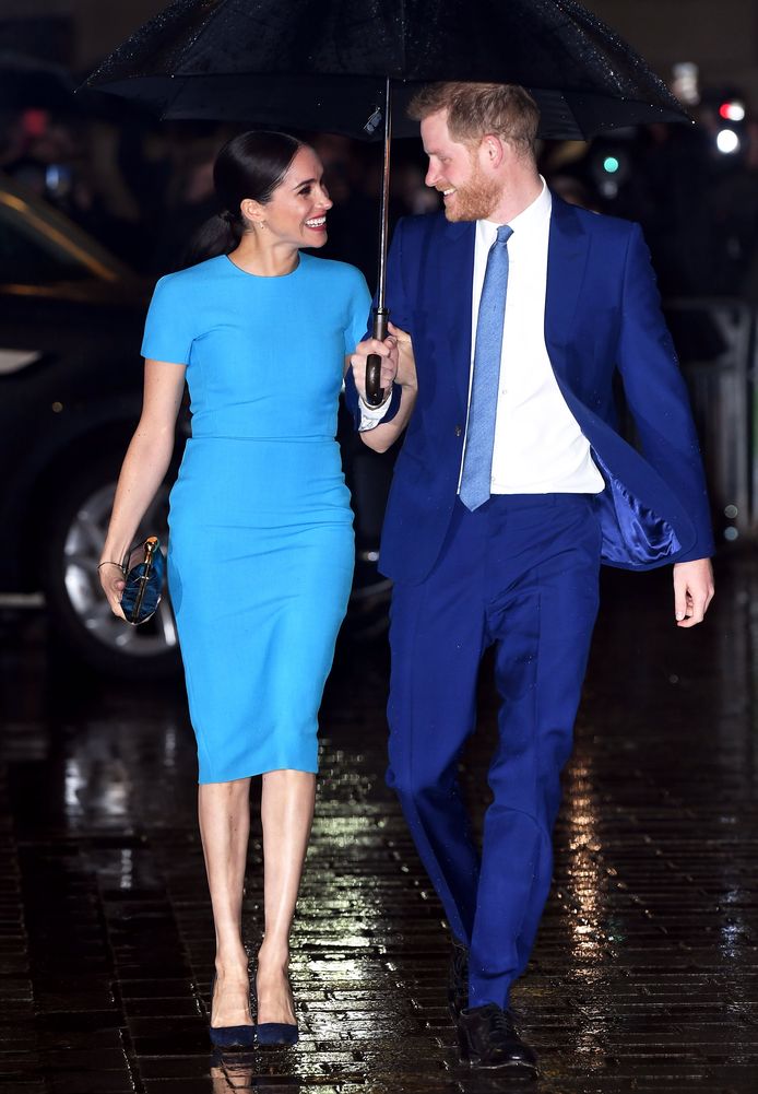 Stralend gelukkige Harry en Meghan trotseren regen tijdens laatste dagen in Londen