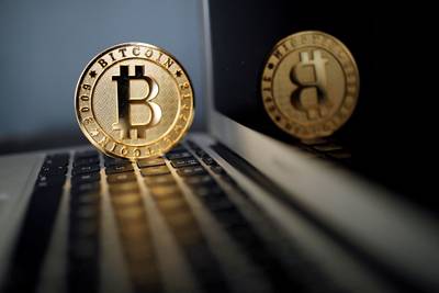Le bitcoin poursuit son plongeon et s'approche de la barre des 20.000 dollars