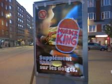 “Murder King”, “Ta santé, leur choix”: des militants liégeois détournent des pubs pour la malbouffe