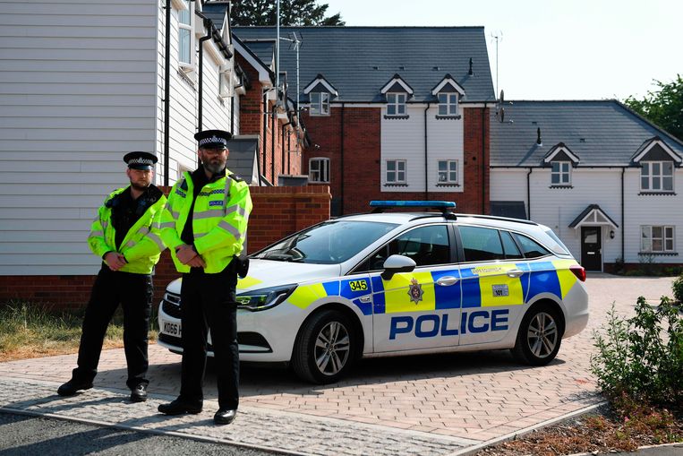 Agenten bij het adres van de vergiftigde Britten in Amesbury. Beeld AFP