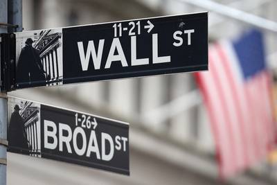 Wall Street ends slightly lower after Federal Reserve rate decision