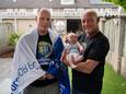 Drie generaties FC Eindhoven-supporters: Dennis (), Paul ('Harry') en de kleine Nina van den Bos.