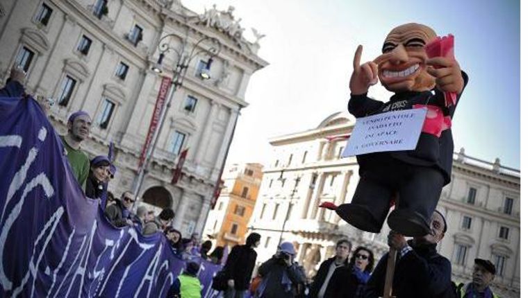 In heel Europa vinden anti-Berlusconi demonstraties plaats. Ook in Rome uiteraard. (EPA) Beeld 