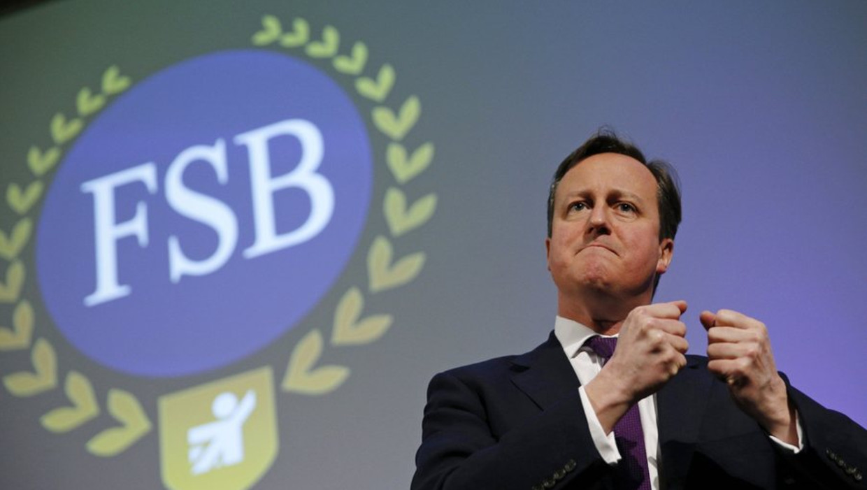Britse premier David Cameron, tijdens het bezoek aan de FSB in Londen. Beeld reuters