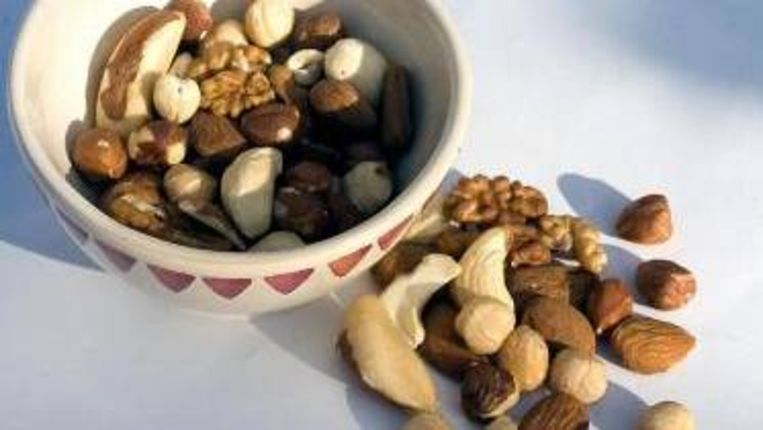 Er is een relatie tussen het eten van nootjes en de bescherming tegen ziektes. Geen causaal verband. Beeld 