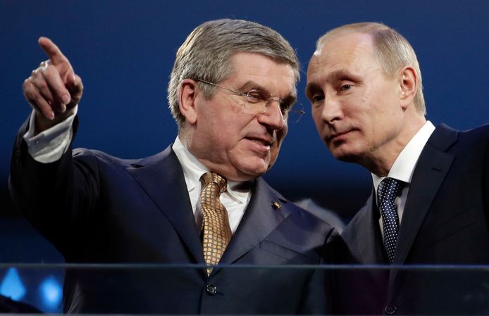 Pertandingan Musim Dingin 2014 di Sochi: Thomas Bach, Presiden Komite Olimpiade Internasional, dan Vladimir Putin.