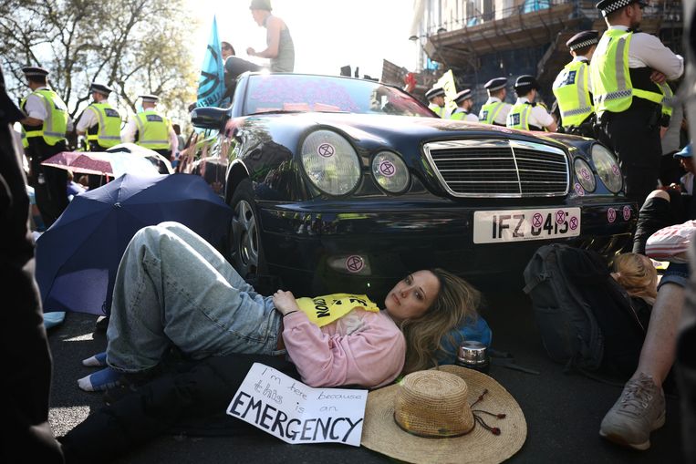 Extinction Rebellion activists chained themselves to a car in central London in spring 2022. ImageREUTERS