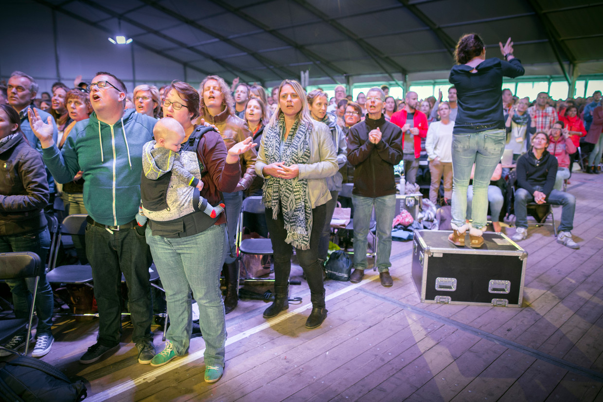 Met z'n allen zingen tijdens de Opwekking-conferentie van vorig jaar. Beeld Herman Engbers