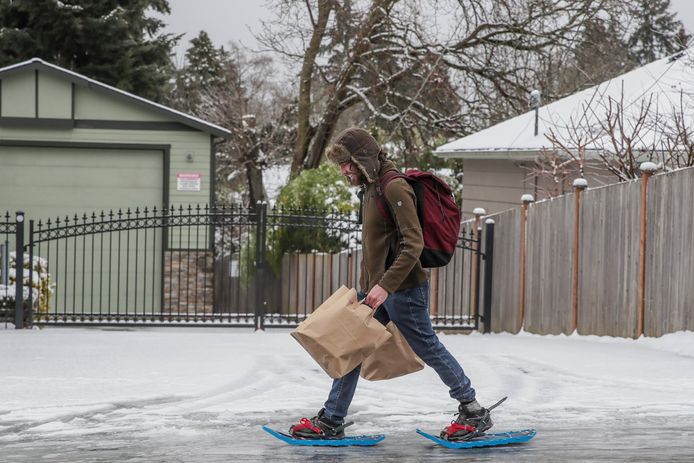 A man goes grocery shopping in Seattle on special spikes.