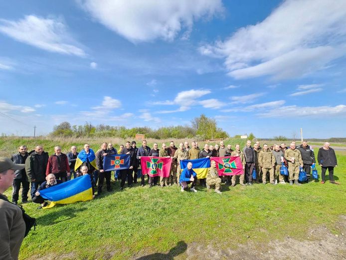 Ukrainian prisoners of war were deployed today at an undisclosed location for a photograph after a prisoner exchange with Russia.