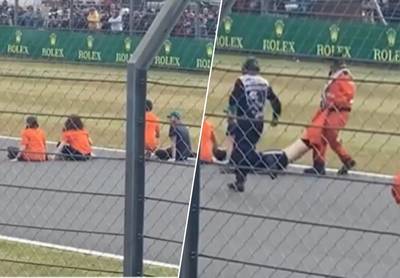 Levensgevaarlijke actie: activisten gaan tijdens (!) F1-race neerzitten op circuit waar bolides makkelijk met 300 km/u voorbij scheuren