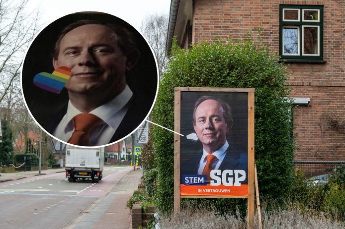 Op verkiezingsposters van SGP in Ermelo zijn regenbooghartjes geplakt, ook bij wethouder Leo van der Velden in de voortuin.