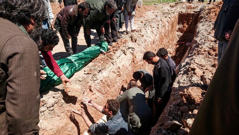 Syrische begrafenis na de aanval in de Iblib-regio. Beeld afp