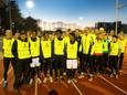 Trainer Theo Terhaard (tweede van links) met hardlopers van Atletiekvereniging Cifla uit Nijmegen in 2017.