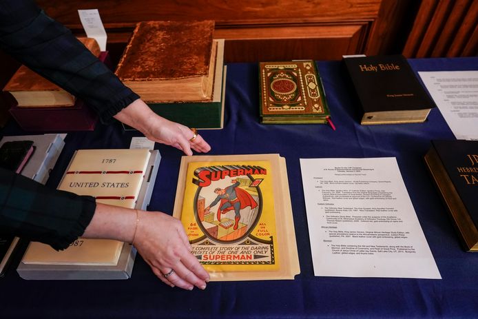 A congressional aide compares the comic strip with other books used for the oath, including a Bible, Torah, Quran and the US Constitution.  (03/01/2023)