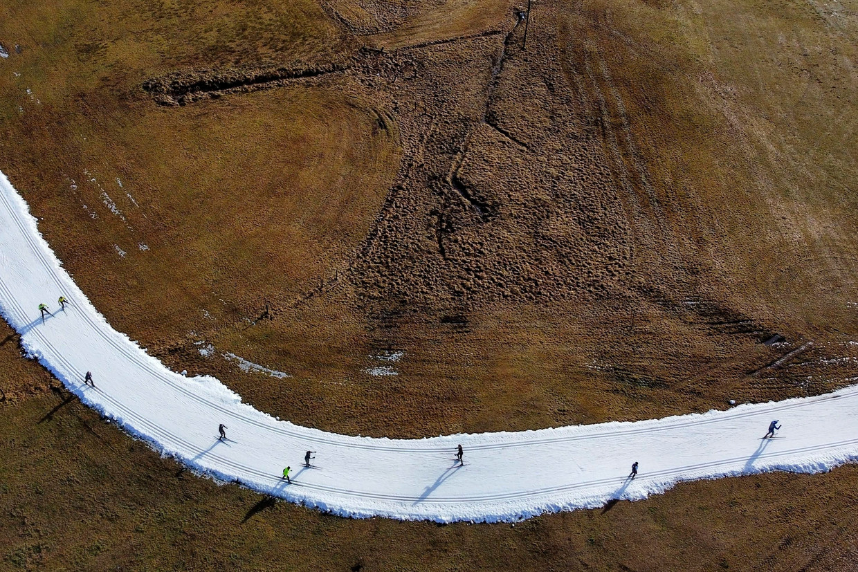 Cross-country skiing on a trail in Ramsau, Austria.  Photo by Matthias Schrader/AP