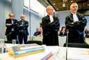 Twee patiënten, links, naast hun advocaten, Luc Rohof en Ivo Sindram