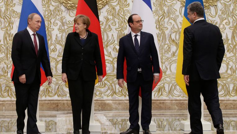 V.l.n.r.: De Russische president Vladimir Poetin, de Duitse Bondskanselier Angela Merkel, de Franse president François Hollande en de Oekraïense president Petro Porosjenko. Beeld epa