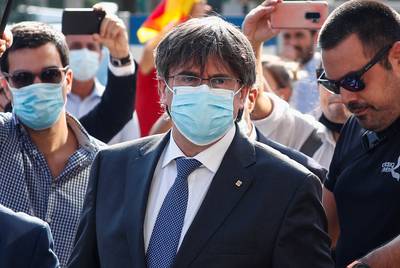 Catalaanse leider Puigdemont aangekomen bij Italiaanse rechtbank