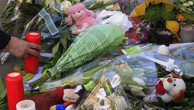 Bloemen voor de slachtoffers. Beeld Reuters