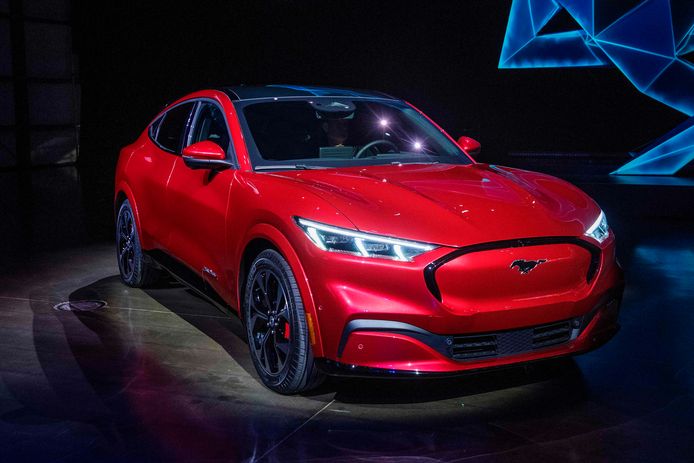 Ford reveals its first mass-market electric car the Mustang Mach-E, which is an all-electric vehicle that bears the name of the companys iconic muscle car at a ceremony in Hawthorne, California on November 17, 2019. - This is Ford's first serious attempt at making a long-range EV and will be the flagship of a new lineup that will include an electric F-150 pickup truck. (Photo by Mark RALSTON / AFP)