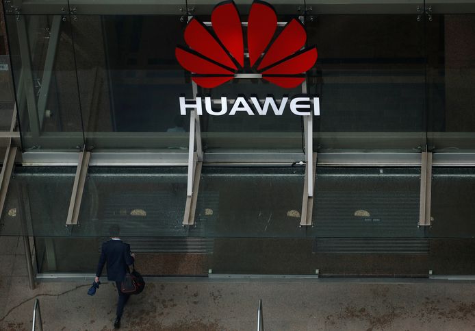 A man walks into the offices of telecommunications company Huawei in Auckland, New Zealand,  October 30, 2018. REUTERS/Phil Noble