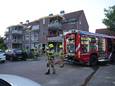 Het balkon is door de brand zwartgeblakerd.
