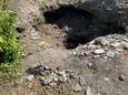Wie weet er meer van dit gat in de grond.