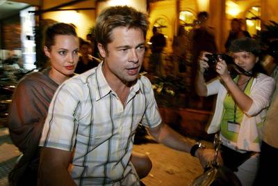 “Brad Pitt en Angelina Jolie zetten paparazzifoto's in scène”