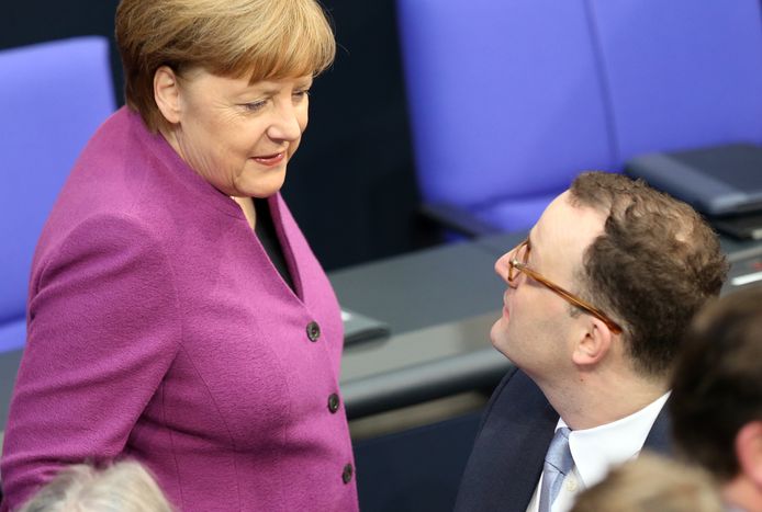 Angela Merkel en Jens Spahn