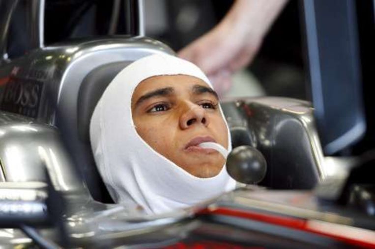 F1 Drivers sit in car