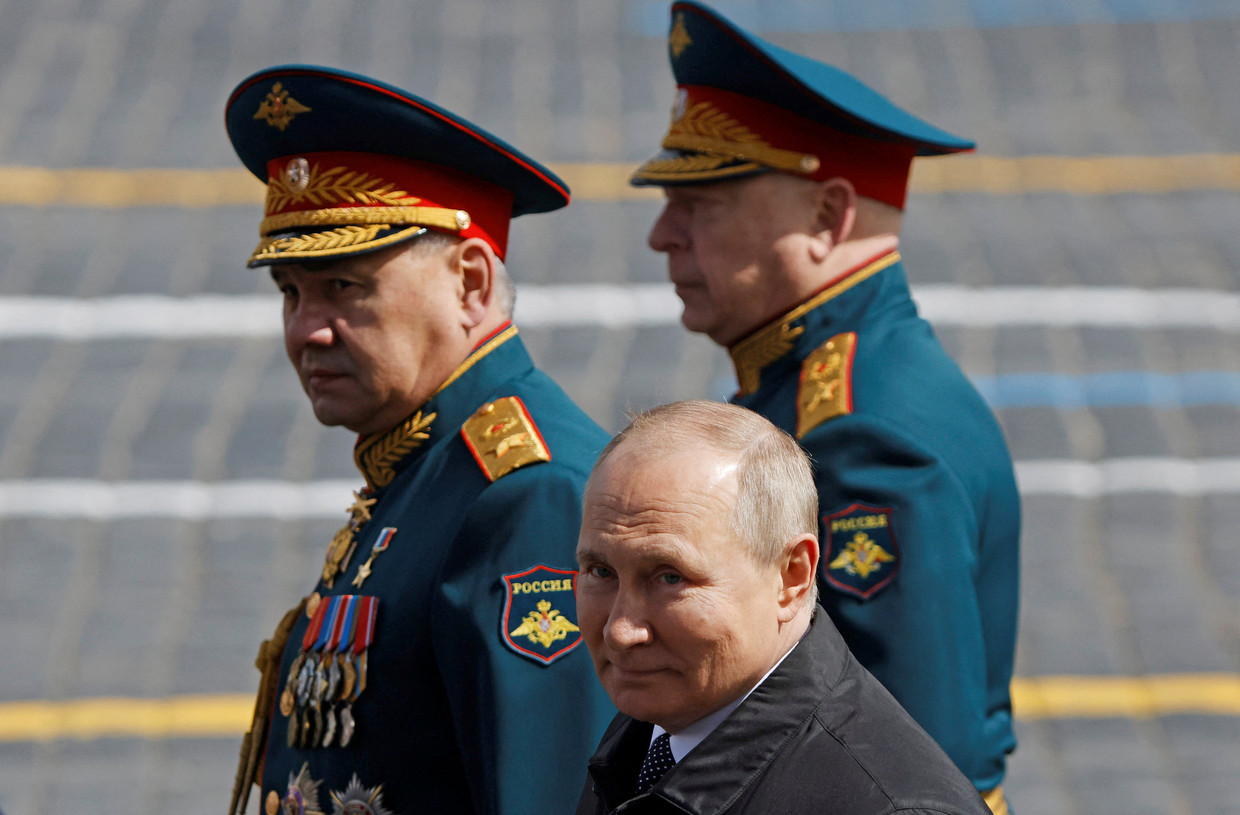 President Putin with Defense Minister Sergei Shoigu (left) and the commander of the Russian Army, Oleg Salyukov, in Moscow this afternoon.  Reuters photo