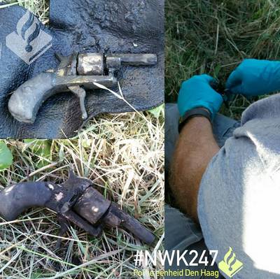 Magneetvisser vist antiek revolver op